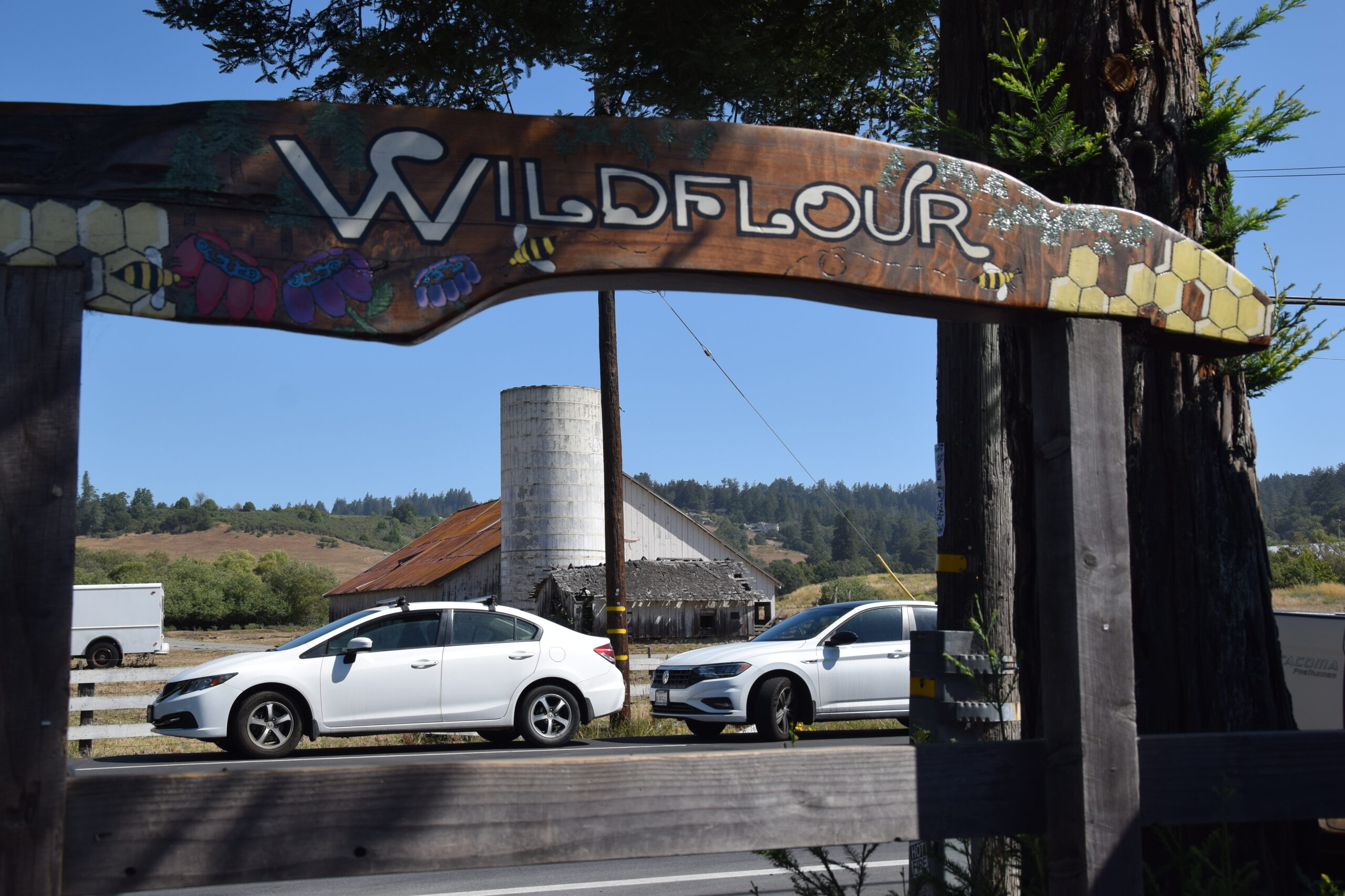 Wooden sign for Wildflour Bread in Bodega Bay