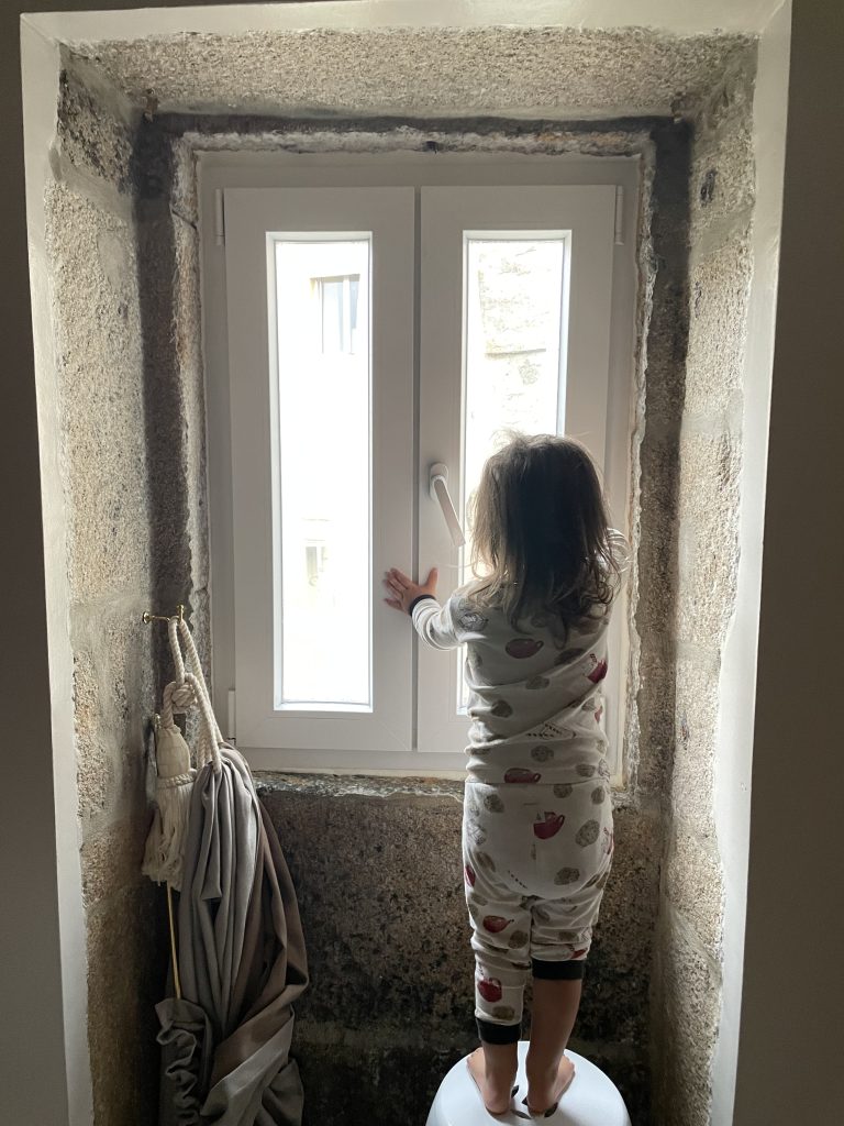 Light pouring into a dark room in Porto Portugal